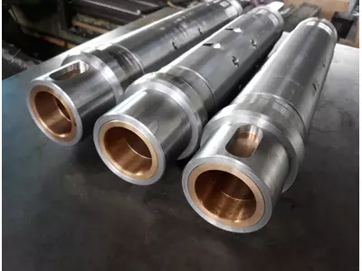 Production of spindles for high-speed stone-processing machines